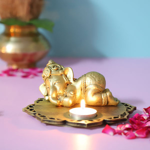 Sleeping Ganesha Idol With Decorative Wooden Base And T Light