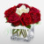 11 Red n 1 White rose in Cube Vase